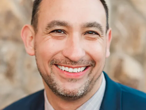 Headshot of Jake Martinez smiling