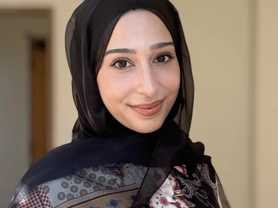 Headshot of Fatima Jebahi smiling at camera