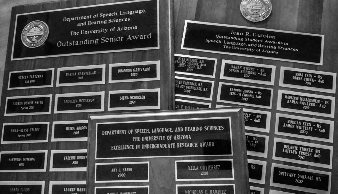 Collage of three award plaques