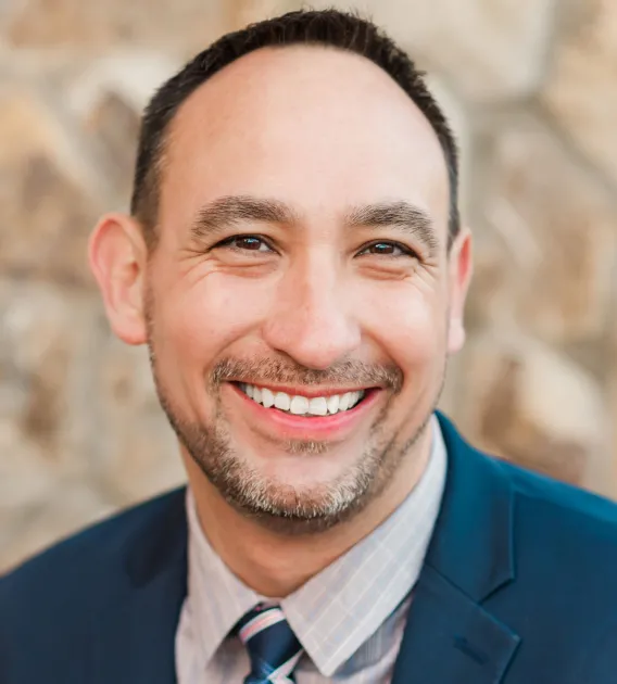 Headshot of Jake Martinez smiling