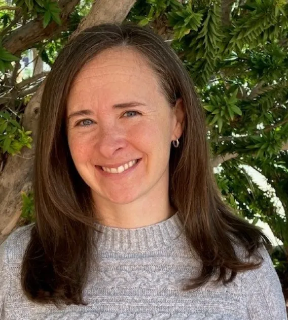 Headshot of Michelle Raymond smiling