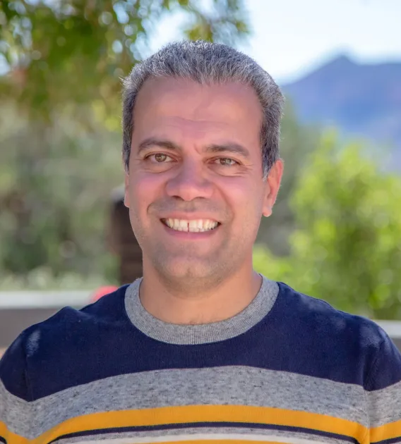 Headshot of Ali Pourjavid smiling